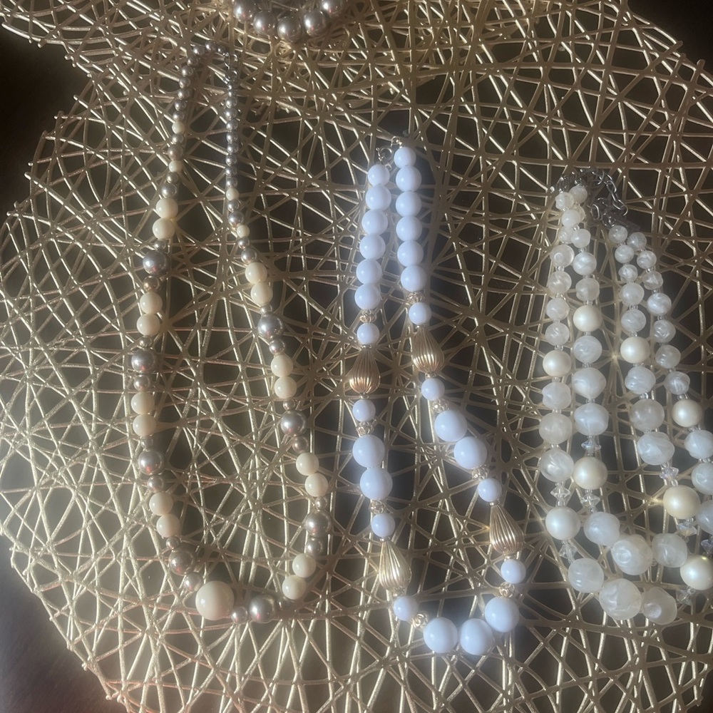 Four used costume necklaces!